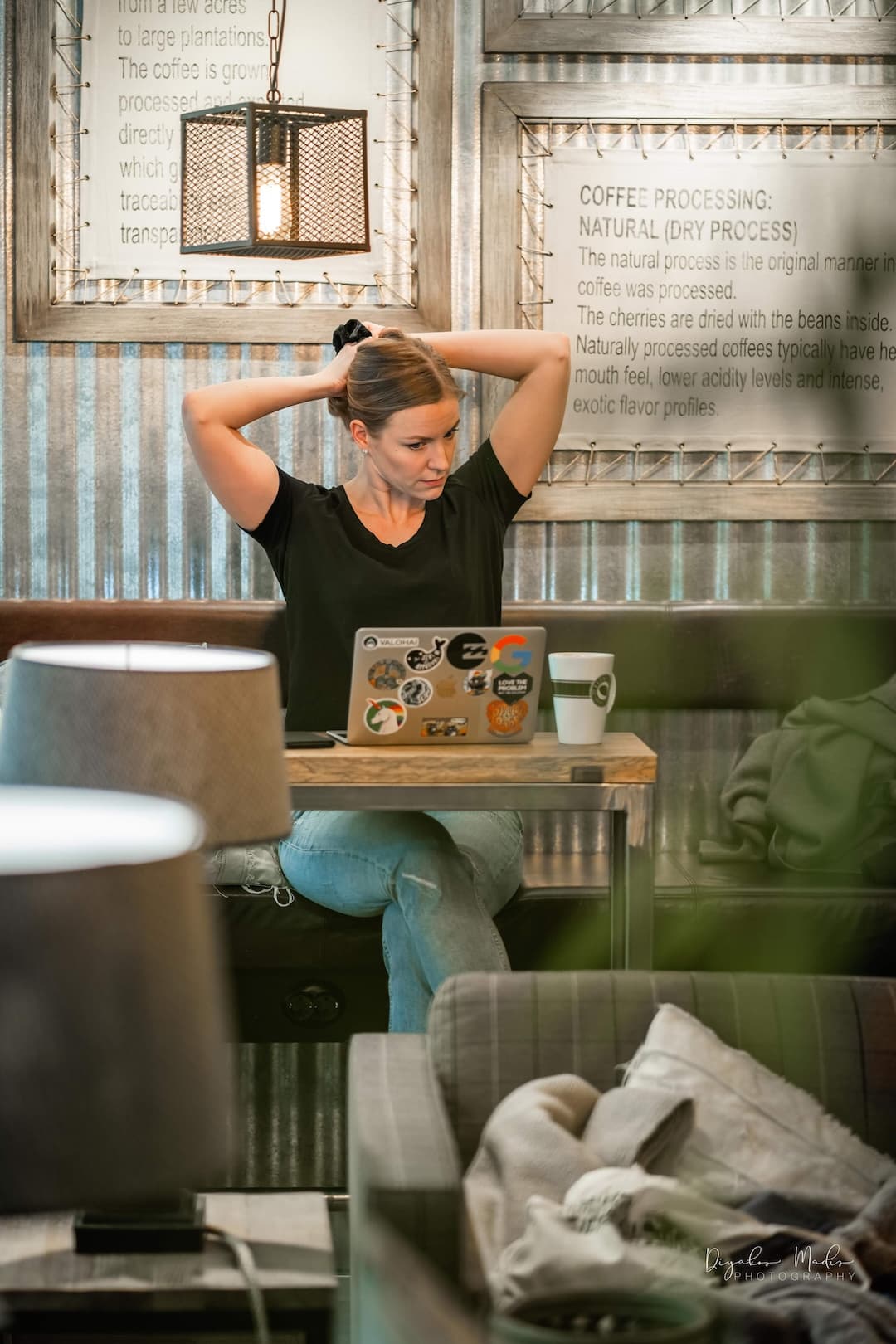 Woman sitting at a desk with a laptop